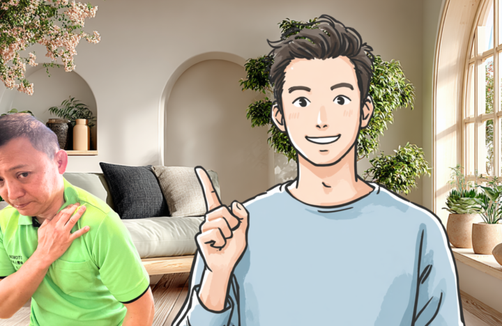 鎖骨に手を当てている男性