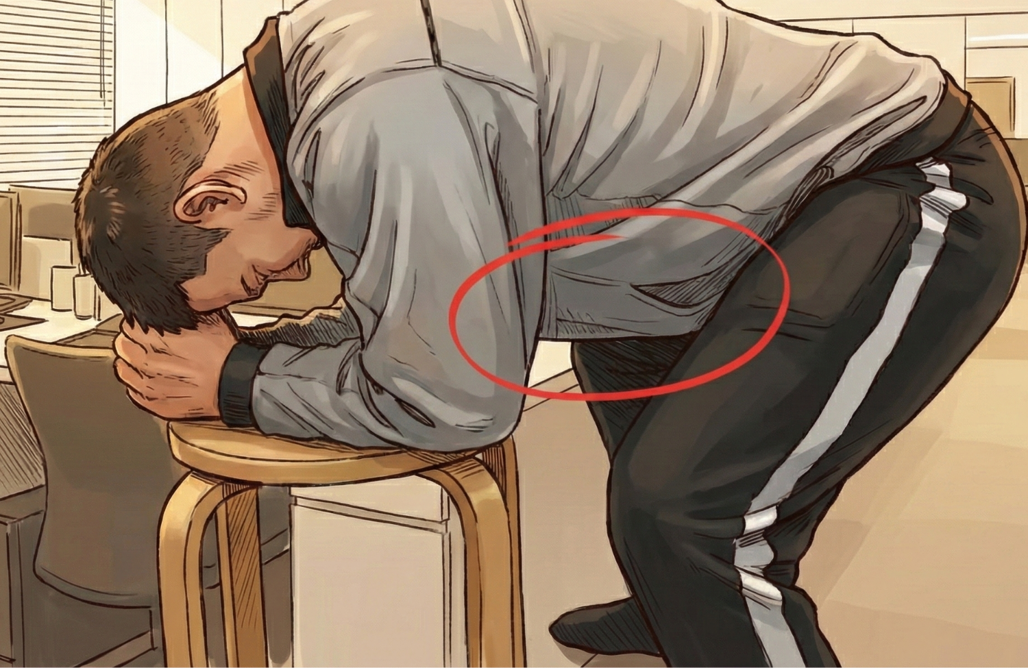 膝を開いた状態でストレッチをしている男性