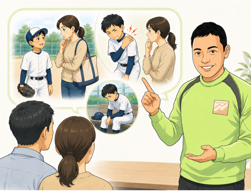 保護者に説明している男性